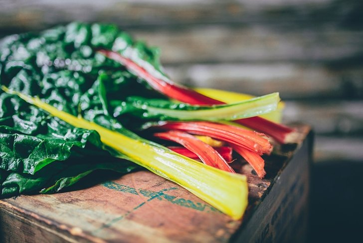 Swiss chard on a rustic background